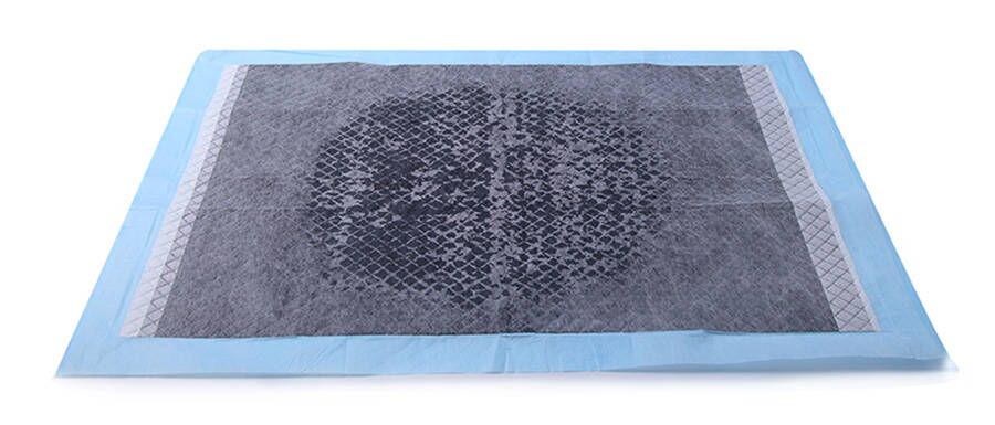 Super absorbent under pad